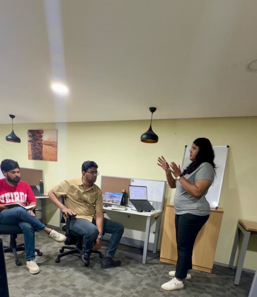 A colleague leading a knowledge-sharing session in the Hyderabad office