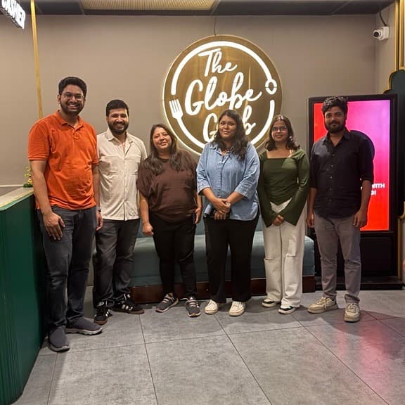 Six Acceler8 GLOBAL team members together at a team outing